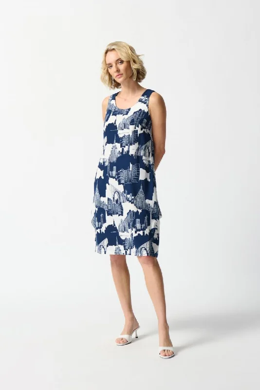 sleeveless white dress -Joseph Ribkoff Vanilla/Midnight Blue Cityscape Sleeveless Shift Dress 242157