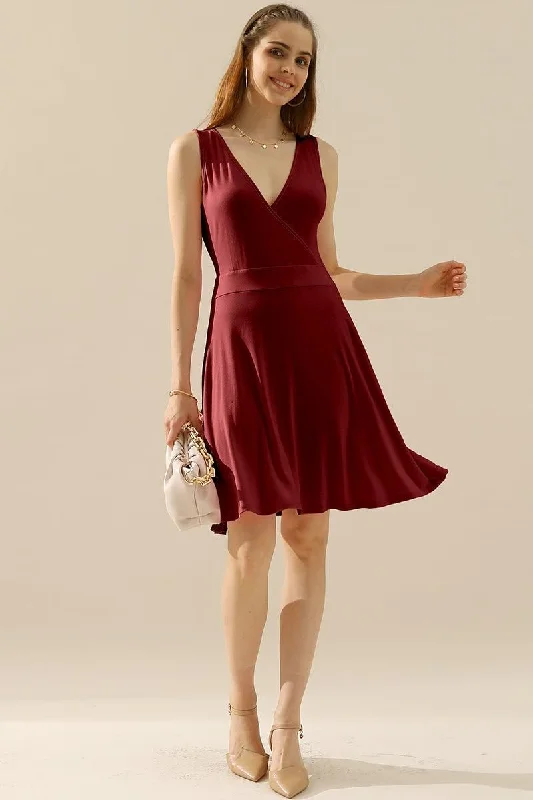 sleeveless crisscross dress -DEEP V NECK SLEEVELESS SWING FLOUNCE DRESSES